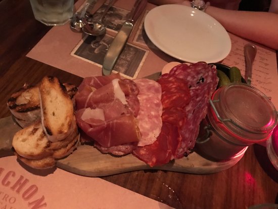 Bouchon Bistro signature dishes Ham & Cheese Baguette
Parisian Macaron
Assiette De Charcuterie